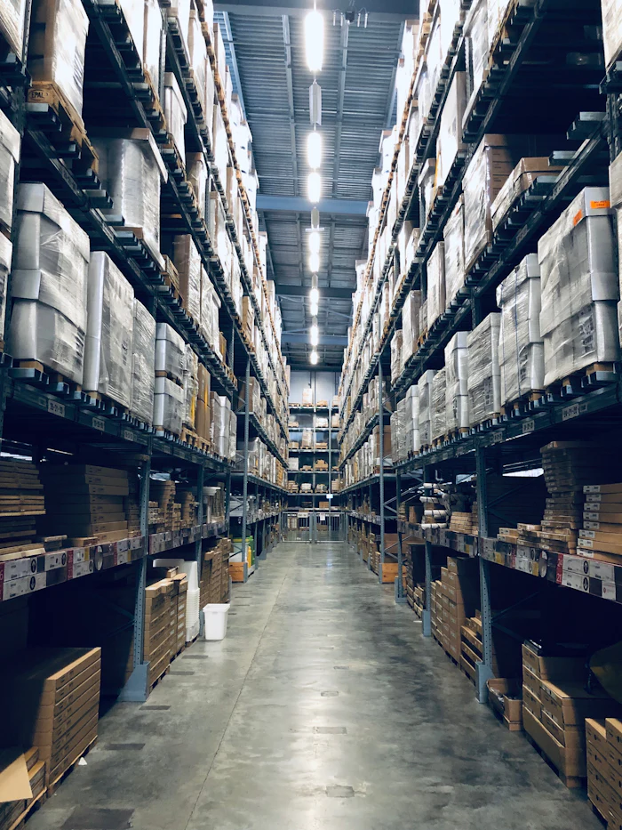Printed folding cartons stacked in a production area