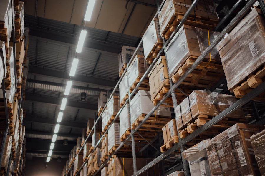 Stacked cardboard packaging cartons in a warehouse awaiting dispatch